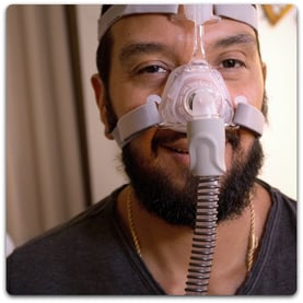 Man wearing CPAP mask